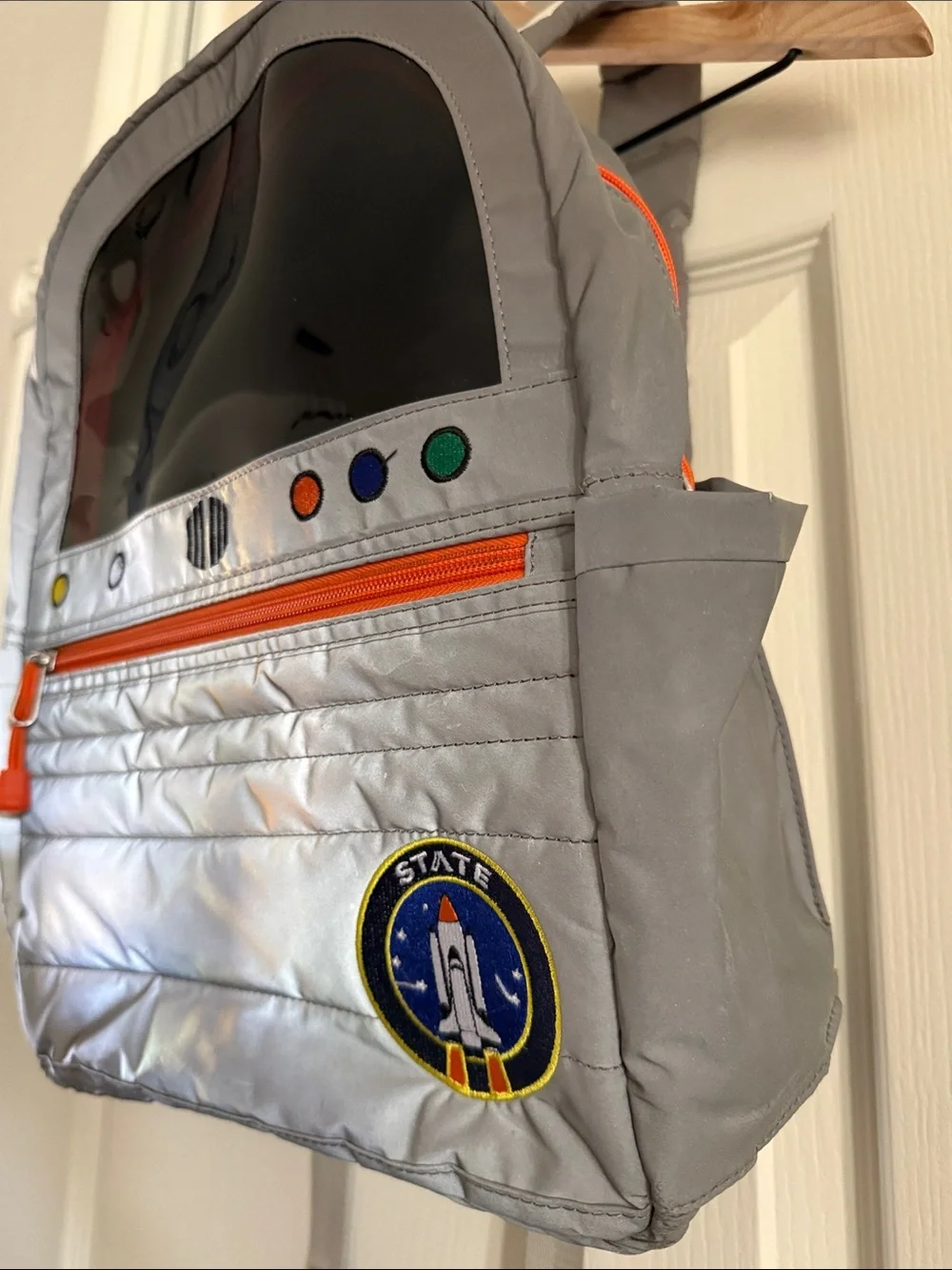 STATE Mini Kane Kids Travel Backpack in “reflective astronaut” design